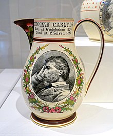 Thomas Carlyle earthenware memorial jug, 1881. The floral decoration is hand-painted on a printed outline. Thomas Carlyle pitcher, Josiah Wedgwood and Sons, Etruria, Staffordshire, England, 1881, glazed earthenware - Peabody Essex Museum - DSC07061.jpg