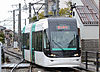 An TLR0600 train on the Toyama Light Rail Toyama Port Line in 2015