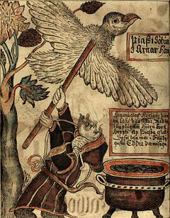 un grand oiseau en vol. Lui est attaché un long bâton auquel se tient un homme. À gauche, un arbre ; à droite, un chaudron ; deux rectangles remplis d'écriture manuscrite.