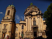 Main facade of the Dominican Church in Lviv with the Latin phrase "Soli Deo honor et gloria". Tserkvaulvovi.JPG