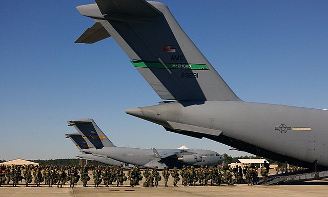 82nd Airborne Division paratroopers boarding a transport aircraft