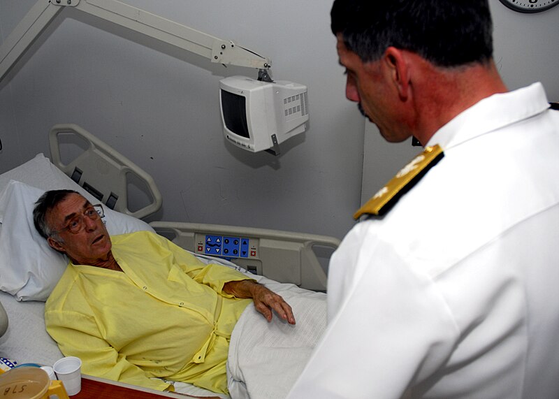 File:US Navy 070418-N-2903M-102 Rear Adm. Michael C. Vitale visits World War II veteran Royce D. Hammer.jpg