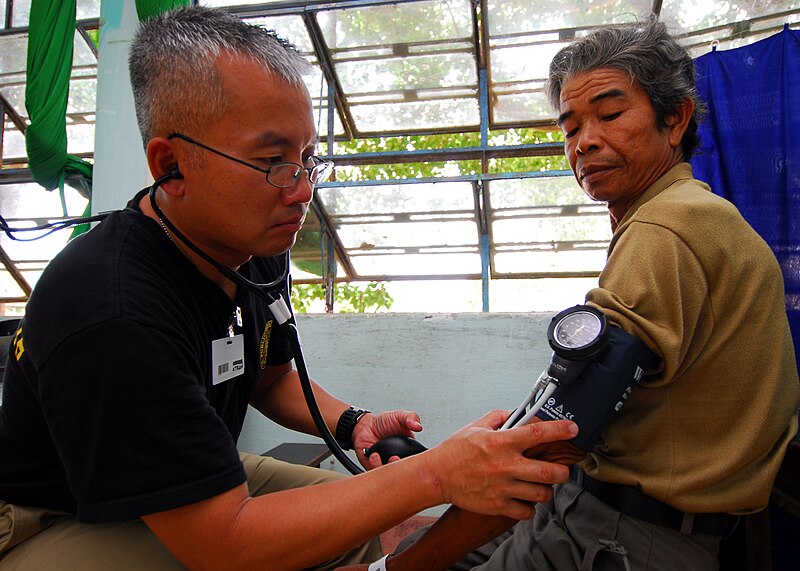 File:US Navy 100606-N-4044H-159 Lt. Cmdr. Hung Tran checks the blood pressure of a Vietnamese patient during a Pacific Partnership 2010 medical civic action program.jpg