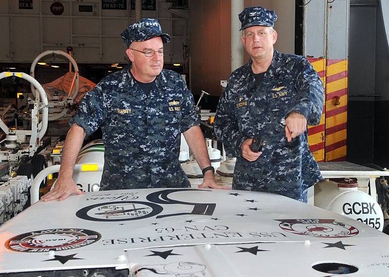 File:US Navy 110713-N-CH661-240 Adm. John C. Harvey Jr., commander of U.S. Fleet Forces Command, left, listens as Capt. Dee L. Mewbourne, commanding off.jpg