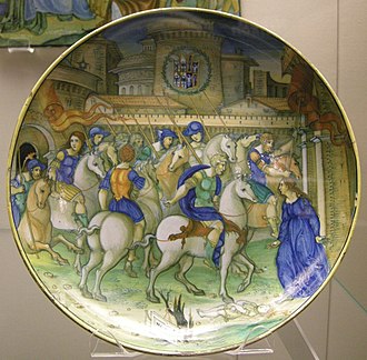 The episode on a maiolica plate, Urbino, 16th century. Urbino, piatto con traiano che ferma il suo esercito fuori roma per ascoltare una richiesta, stemma isabella d'este.JPG