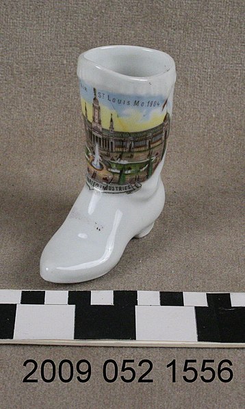 File:White Ceramic Cowboy Boot With Color Transfer Image of Palace of Varied Industries.jpg