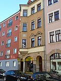 Apartment building in closed development and rear building