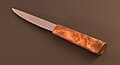 Yakutian knife with birch burr/burl handle. Left side.