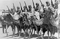 'Coronation' of King Abdullah in Amman on May 25, '46. The Elite Camel Corps of the Arab Legion, passing saluting ba(se) LOC matpc.22548 (cropped).jpg