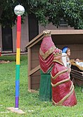 Gay pride Festivus pole at Nativity scene