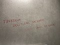 201803 Anti-Spain slogan on the wall of a restroom at BRU.jpg