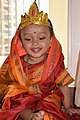 A baby girl child dressed up like Godess Durga in Navratri