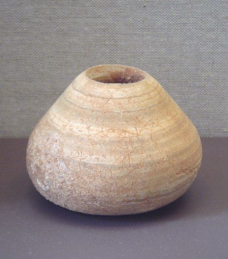 Alabaster pot Mid-Euphrates region 6500 BCE Louvre Museum.jpg