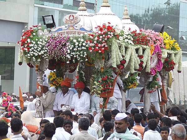 Sandals (paduka) of Sant Dnyaneshwar being carried in a palkhi on their way from Alandi to Pandharpur on the annual pilgrimage (Pandharpur vari)