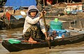 Cambodia-Tonle Sap-214-Frau i Boot-2007-gje.jpg