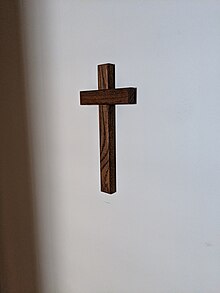 Believers have historically hung a Christian cross on the eastern wall of their homes to indicate the eastward direction towards which they focused their prayers. Cross hanging on eastern wall of a Christian home.jpg