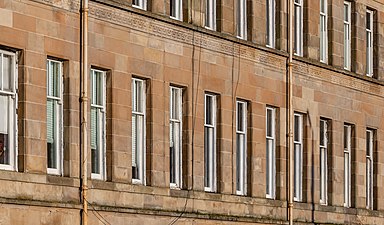 Detail of the facade of 84-112 Nithsdale Road, Glasgow