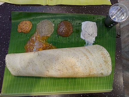 Dosa with chutney and sambar are traditionally served in banana leaf.