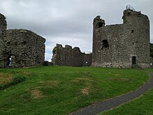 The keep inside the upper ward Dundrum Castle showing the keep and parts of the wall.jpg