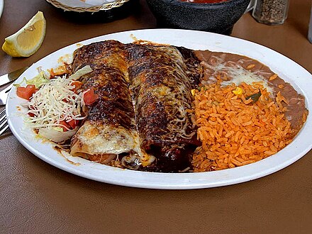 Enchiladas, with Mexican rice and beans