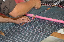 Ikat rebozo being made on a backstrap loom at the Feria de Rebozo in Tenancingo FeriadeRebozo2014 53.JPG