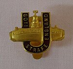 A pin with the slogan Gott strafe England
(may God punish England), created by the Jew
Ernst Lissauer Gott strafe England2.JPG