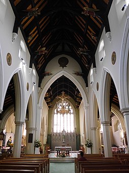 Inside the church, looking east to the chancel Holy Trinity, Brook Green 03.JPG