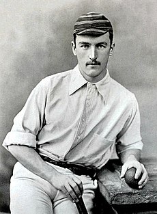 A man bowling a cricket ball