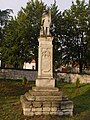 English: Statue of Saint Florian in Pińczów, Poland Polski: Figura św. Floriana z 1907 r. na dziedzińcu kościoła św. Jana Ewangelisty w Pińczowie.