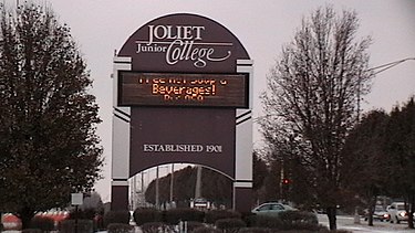 Joliet Junior College, in Joliet, Illinois, established in 1901 by William Rainey Harper and J. Stanley Brown. Joliet Junior College Sign.JPG