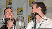 The episode was written by Joseph Mallozzi (left) and Paul Mullie (right). Joseph mallozzi and paul mullie comic con.jpg