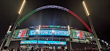 Wembley Stadium lit up in the colours of the Italian flag following Italy's victory London Wembley stadium with Italian flag.jpg