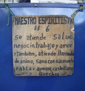 Curandero promoting himself at the entrance to a cemetery in La Paz, Bolivia: "Health, business, work and love are attended, also calls of encouragement, heals with sahumerio and speaks Aymara, Spanish and Quechua." Maestro espiritista.png