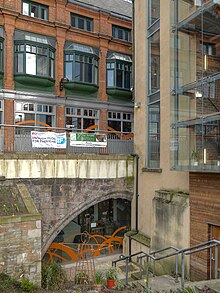 The only part of Hanging Bridge visible from outside, located under Hanging Bridge passageway and part of the Cathedral Visitor Centre building Manchester Cathedral Visitor Centre - geograph.org.uk - 3385583.jpg