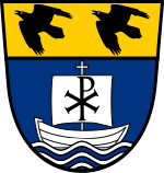 The coat of arms of Saint Meinrad Archabbey