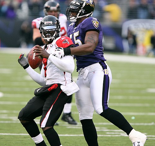 Suggs (right) and Michael Vick of the Atlanta Falcons in 2006.