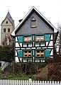 2 sch. Z.  T. half-timbered house in the ensemble at kath.  Church 2nd half of the 19th century