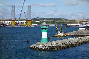 The pier fire from the seaside.  On the right, the construction of further berths at the pier.