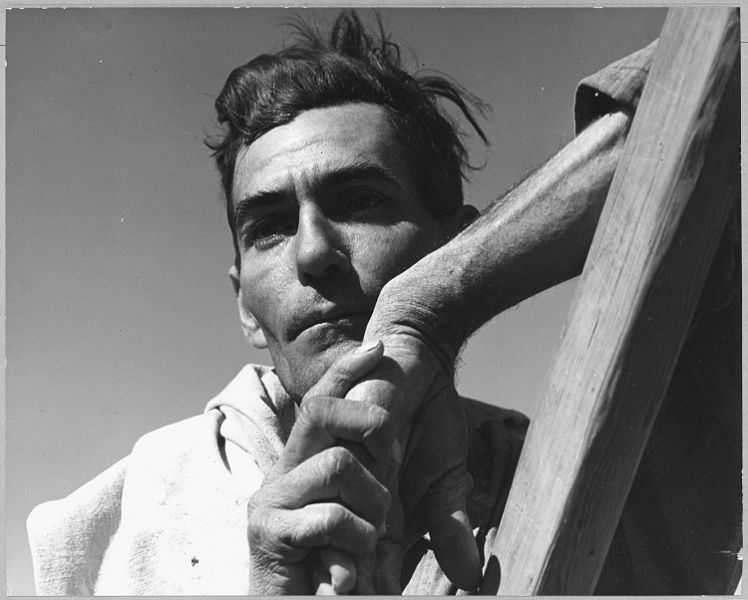 File:Near Coolidge, Arizona. Migratory cotton picker with his cotton sack slung over his shoulder rests a . . . - NARA - 522041.jpg
