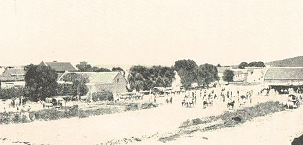 Riders and wagons outspanning in Nelspoort, 1868. Nelspoort 1868 - riders and wagons outspanning - Cape Colony.jpg