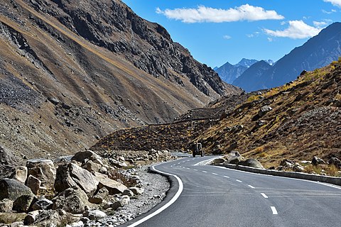 Road crossing the Great Himalayan range in Lahaul, Himachal Pradesh.