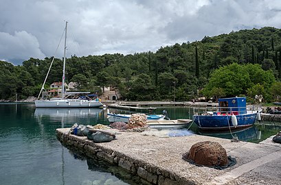 Norwegian Lady II sailing vessel and local fishing boat, moored at Kobaš Bay, Croatia