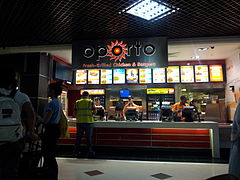 Oporto outlet at Victoria Place, located above Victoria station, in London, England in July 2011 Oporto London Victoria Place.jpg