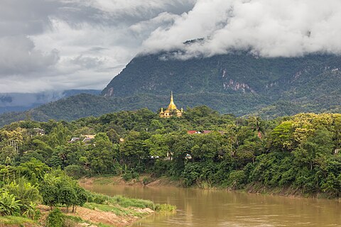 Panoramic view of Wat Pa Phon Phao and Nam Khan river seen from Old French Bridge Luang Prabang Laos