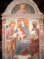 Quirico da Tortona , Madonna and Child with St. James the Greater and St. Agatha, fresco on a church pillar, 1502