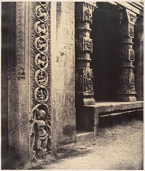 File:Pillars in the Recessed Portico in the Roya Gopuram with the Base of One of the Four Sculptured Monoliths, Madura MET DP138043.jpg