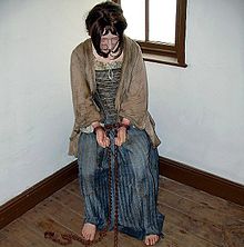 Handcuffs and chains from wrought iron as formerly used on prisoners; Wales, 19th century (museum exhibit) Prisoner in courtroom, Wales 19th century.JPG