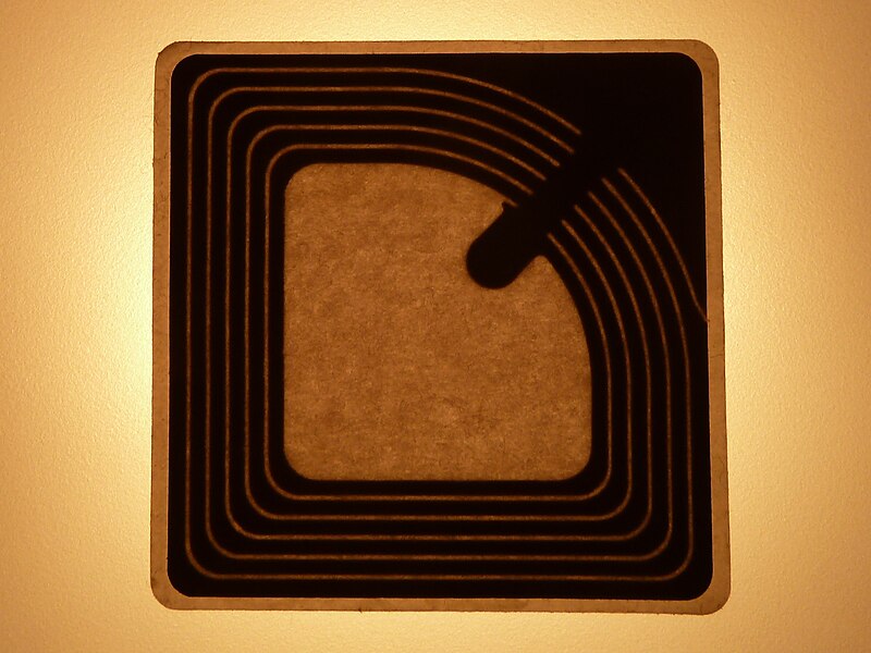 File:RFID tag of a garment.JPG