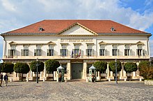 The Sandor Palace is the official residence of the President of Hungary. Sandor-palota napsutesben.jpg