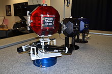 A SPHERES satellite is mounted on an air carriage at the 3 DoF laboratory. SPHERES satellite on air carriages.jpg